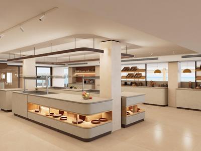 Panadería moderna con estantes bien iluminados y una gran vitrina.