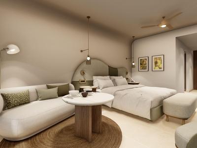 Modern hotel room with double bed, sofa, and warm tones.