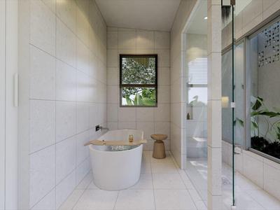 Moderner Badezimmerbereich mit freistehender Badewanne, Glasdusche und Fenster mit Blick ins Grün.