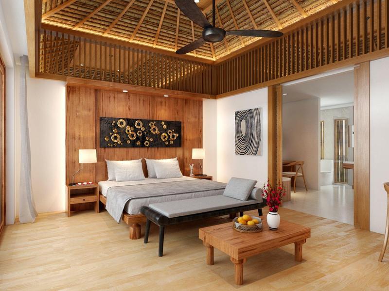 Nowoczesny pokój hotelowy z drewnianą podłogą, wysokim sufitem i wygodnym łóżkiem podwójnym.