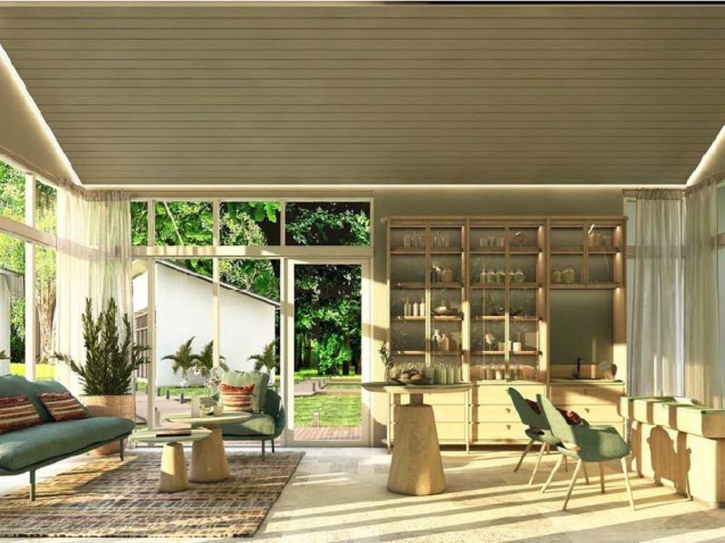 Jasny nowoczesny pokój hotelowy z dużymi oknami, roślinami i wygodnymi miejscami do siedzenia.