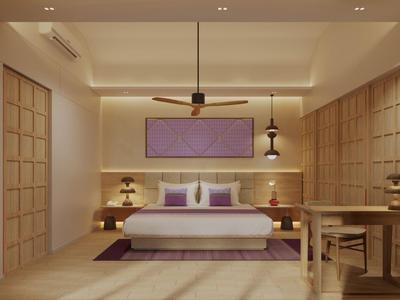 Modernes Hotelzimmer mit großem Bett, Deckenventilator und schlichter Holzdekoration.