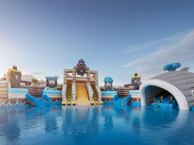 Parque acuático con grandes toboganes coloridos y piscinas bajo un cielo azul.