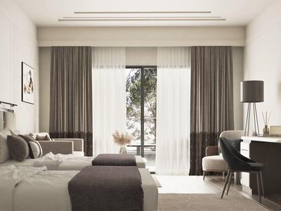 Modern hotel room with two beds, desk, and view of a balcony