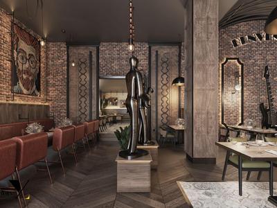 Elegancki salon fryzjerski z ceglaną ścianą, skórzanymi fotelami i stylowym oświetleniem.