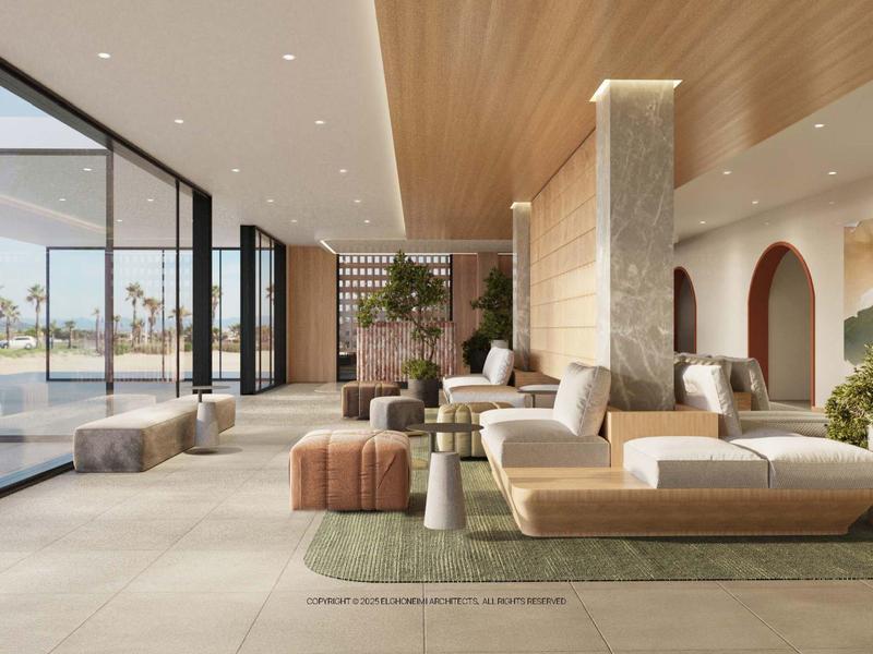 Moderner Hotel-Loungebereich mit großen Fenstern, bequemen Sitzmöbeln und warmem Holzdekor.