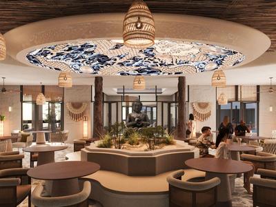 Moderner Hotel-Loungebereich mit ovaler Deckenbeleuchtung und rundem Sitzbereich im Zentrum.