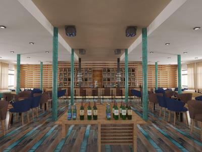 Restaurant moderne avec de longues tables en bois, des chaises et une étagère à vin au centre.