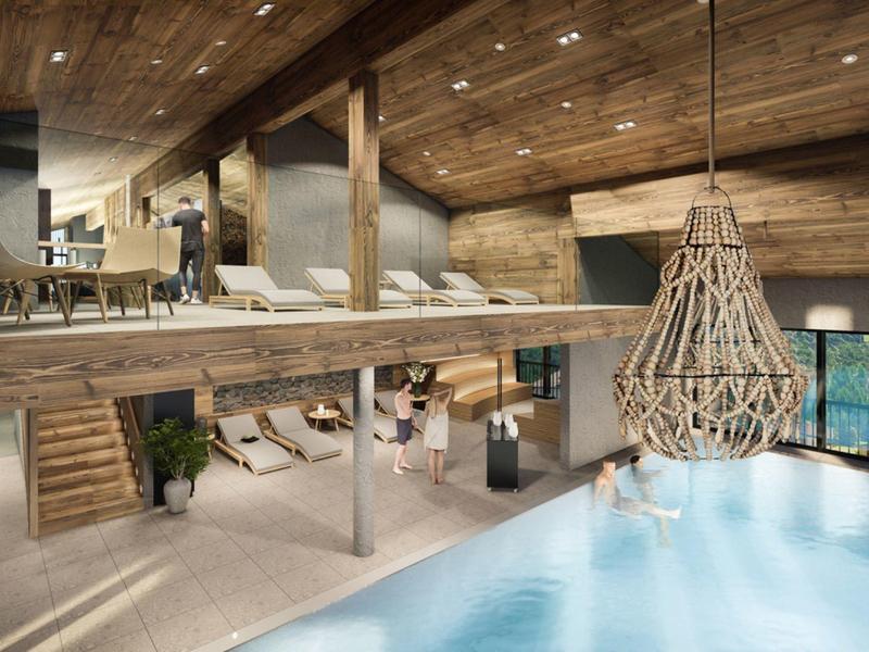 Großes Hallenbad mit Holzdecke, moderner Möblierung und Panoramafenstern mit Außenblick.