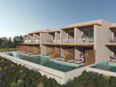 Moderne zweistöckige Villen mit großen Glasfronten und privaten Pools vor klarem Himmel.