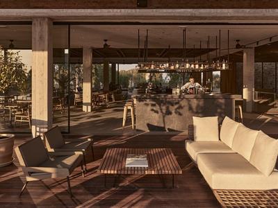 Moderner Lounge-Bereich mit gemütlichen Sofas, Stühlen und warmem Holzfußboden in hellem Licht.