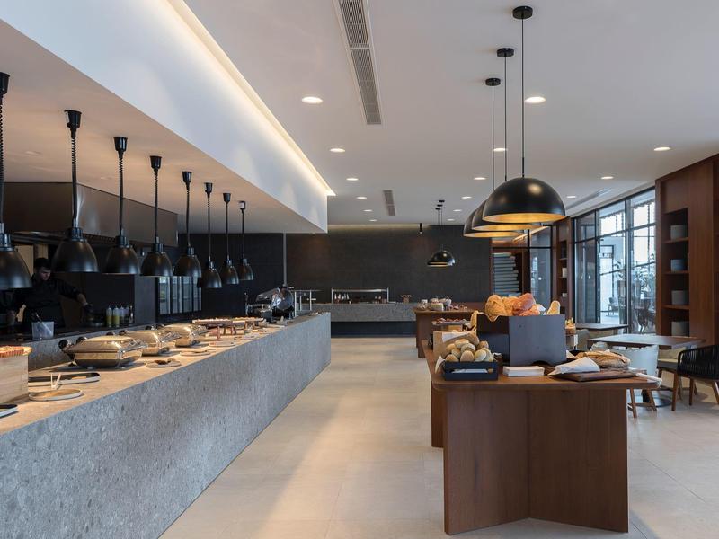 Modern buffet restaurant with spacious seating and stylish interior design.