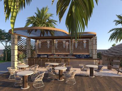 Moderner Außenbereich mit Bar und Sitzgelegenheiten unter Palmen bei Sonnenuntergang