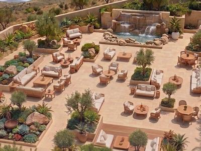 Große Terrasse mit Liegestühlen, Pflanzen und Wasserspielen in einer Hotelanlage.