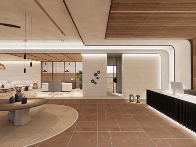 Área de recepción moderna con alfombra redonda, asientos y mostrador iluminado.