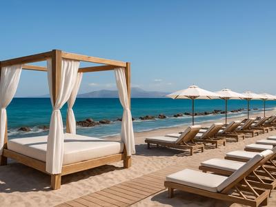 Cama de playa de lujo y tumbonas con sombrillas junto al mar bajo un cielo despejado