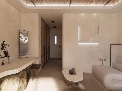 Habitación de hotel minimalista con asientos cómodos, iluminación suave y colores naturales.