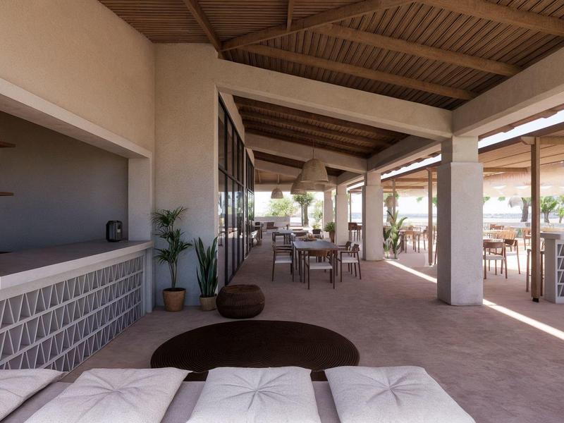 Sala cubierta en terraza con asientos cómodos y elementos modernos de madera.