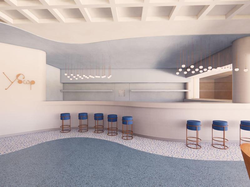 Área de bar moderna de hotel con taburetes azules y mostrador curvo junto a una piscina.