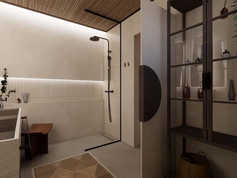 Baño moderno con ducha a ras de suelo, paredes blancas con azulejos y techo de madera.