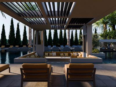 Moderner Außenbereich eines Hotels mit Pool, Lounge-Sesseln und geschütztem Sitzbereich.