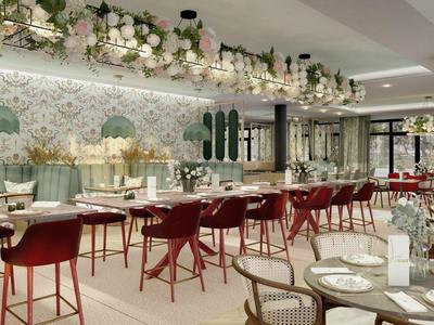 Modernes Restaurant mit roten und beige Stühlen und floral dekoriertem Hintergrund.