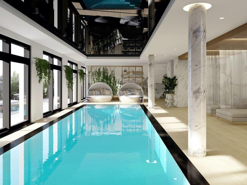 Moderner Innenpool mit großen Fenstern, Pflanzen und gemütlichen Sitzplätzen, helle und dunkle Akzente.