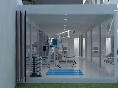 Modern gym with exercise equipment and dumbbells in a bright room