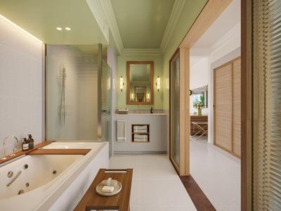 Moderner Hotelbadezimmer mit Badewanne, Duschkabine und Sicht auf das Schlafzimmer.
