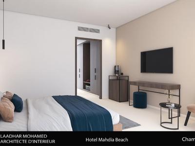 Moderner Hotelzimmer mit weißem und beigefarbenem Wänden, TV, Schreibtisch und gemütlichen Möbeln.