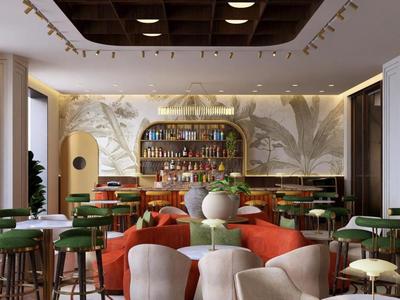 Elegante Hotelbar mit grünen und orangefarbenen Sitzgelegenheiten, großer Kunstwand und warmem Holzdekor.