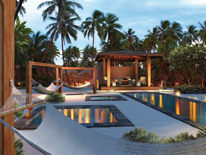 Moderner Poolbereich mit Hängematten, Pavillon und Palmen in tropischem Resort.