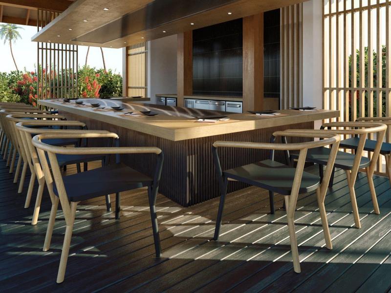 Espace repas moderne en plein air avec table et chaises en bois sur terrasse en bois sous toit.