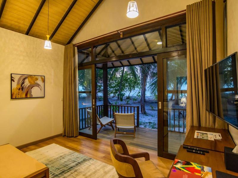 Cozy hotel room with terrace view and garden