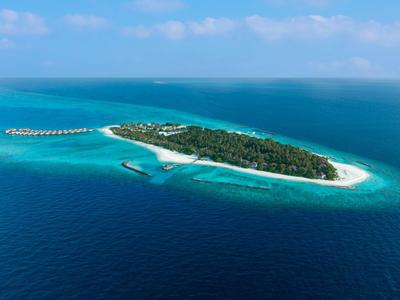 Aerial view of a tropical island with white sandy beach and turquoise water.