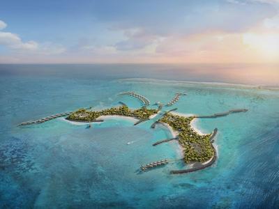 Luchtfoto van een tropisch eiland met stranden, lagune en hotelbungalows boven het water.