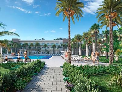 Moderner Hotelpoolbereich mit Palmen, Liegestühlen und blauem Himmel.