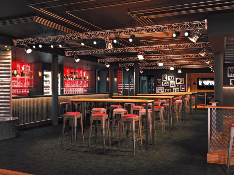 Bar interno moderno con sgabelli rossi e illuminazione sospesa elegante.