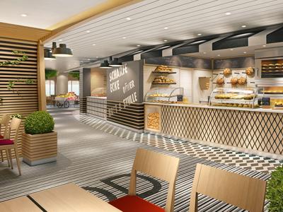 Modern café with wooden chairs, tables, plants, and a counter displaying baked goods.