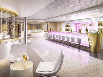 Modern hotel bar with white chairs, illuminated counter, and elegant gold accents.