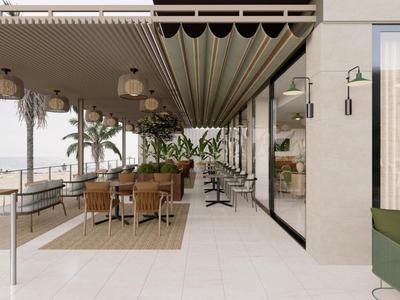 Moderne buitenterras met eetgedeelte, overdekt en met uitzicht op palmomzoomde promenade.