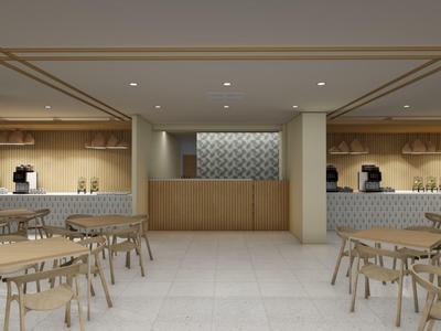 Sala colazione moderna con tavoli in legno, sedie e macchine da caffè a muro.