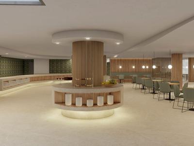 Moderner Hotel-Sitzbereich mit runden Tischen, Stühlen und einer zentralen Säule mit Beleuchtung.