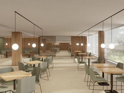 Moderner, heller Restaurantsaal mit Holzvertäfelungen und großen Fenstern zur Natur.