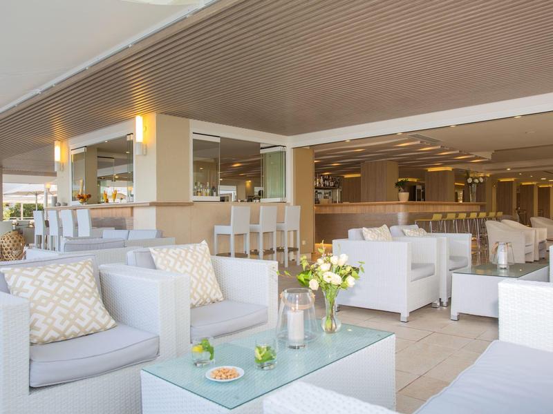 Elegant lounge with white sofas and modern ambiance in a hotel