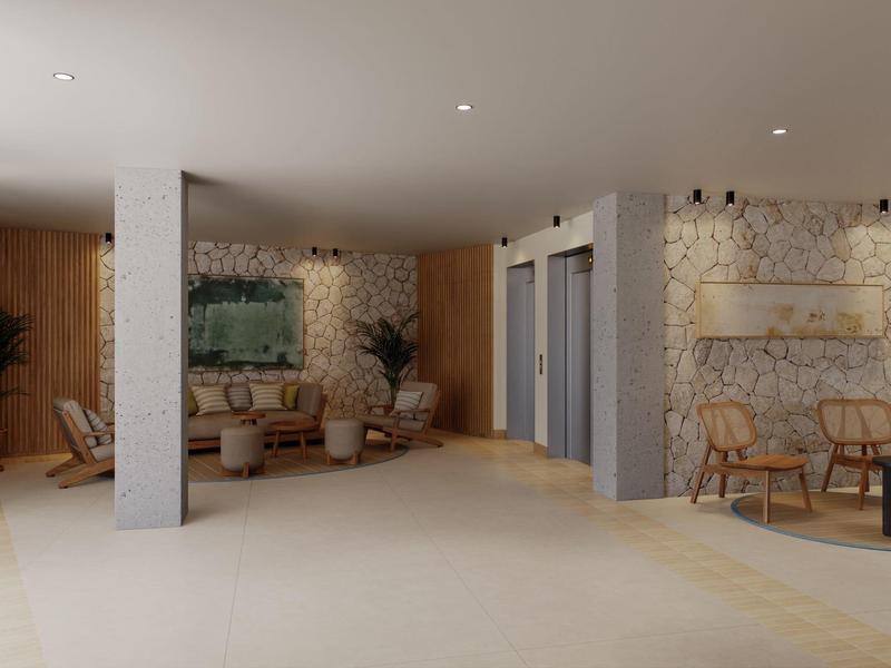 Modern hotel lobby area with seating groups, elevators, and warm wood and stone design.