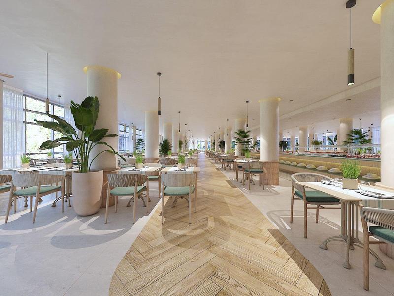 Comedor moderno y luminoso con suelo de madera, paredes blancas y grandes plantas.