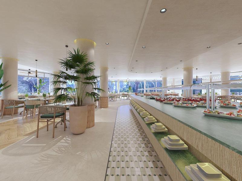 Área de lobby de hotel moderna y luminosa con asientos y un largo bufé con comida.