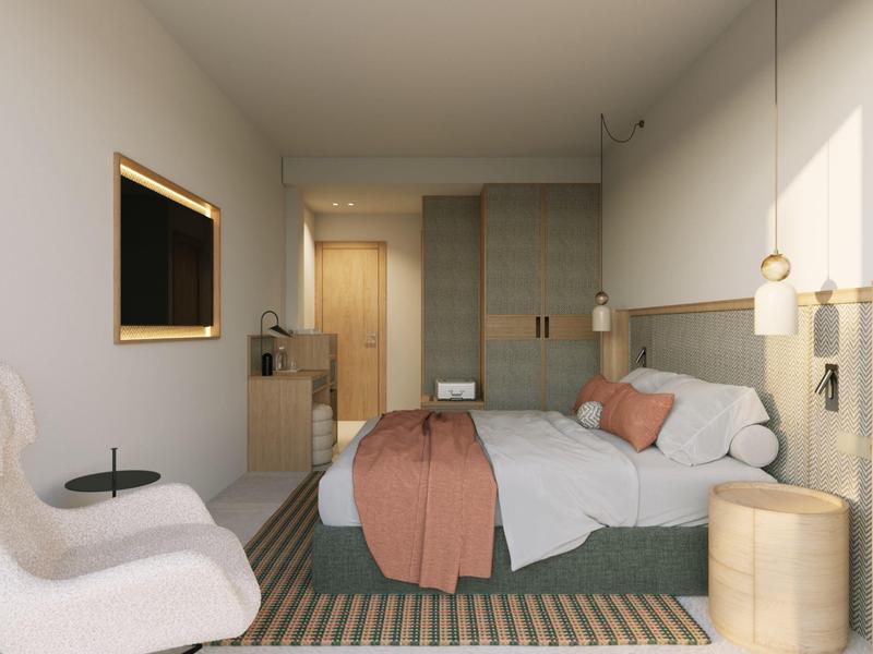 Moderní hotelový pokoj s manželskou postelí, pohodlnými křesly a měkkým osvětlením.