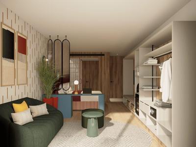 Modernes Hotelzimmer mit Sofa, Couchtisch, Kleiderschrank und warmen Holzakzenten.